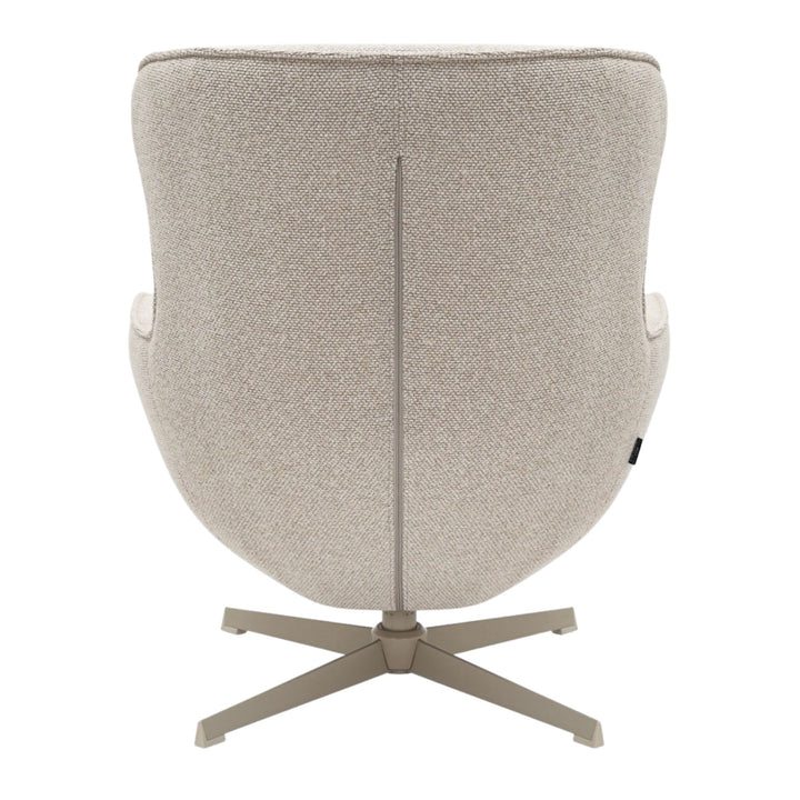Rear view of the Nuba Lounge Chair displaying the smooth fabric and metal swivel base.