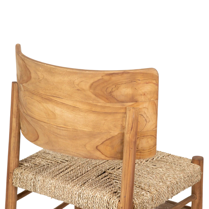 Angled rear view displaying sculpted backrest curve.