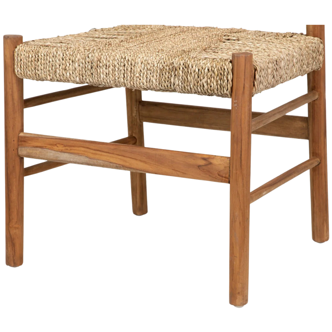 Close-up of handwoven seagrass seat texture and teak frame joints.