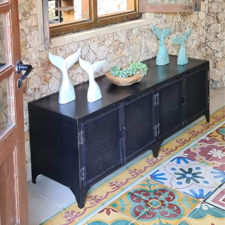 Industrial-style New York Buffet styled with decorative vases and bottles.
