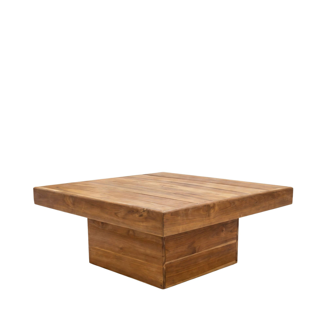 Front angled view of the Oahu teak coffee table with a square top and substantial pedestal base