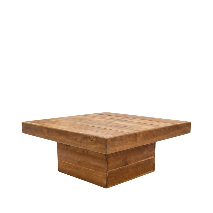 Front angled view of the Oahu teak coffee table with a square top and substantial pedestal base