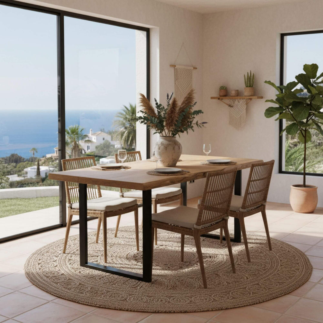 Dining room setting featuring the Oak Dining Table paired with modern chairs.