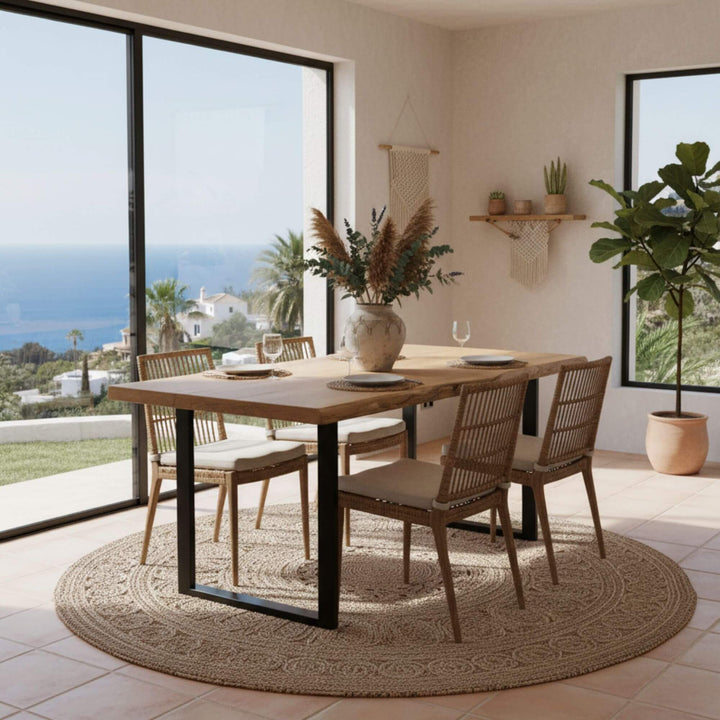 Dining room setting featuring the Oak Dining Table paired with modern chairs.