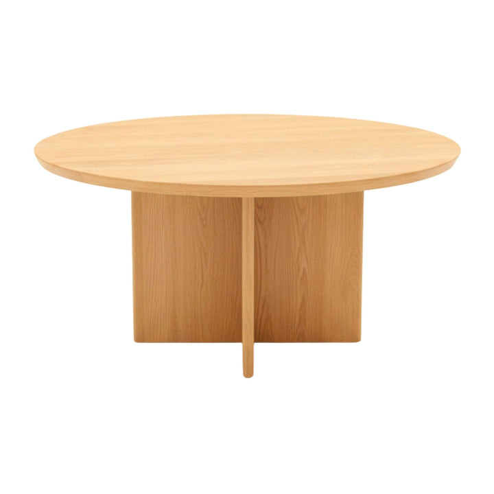 Front view of the natural oak round dining table with X-legs.