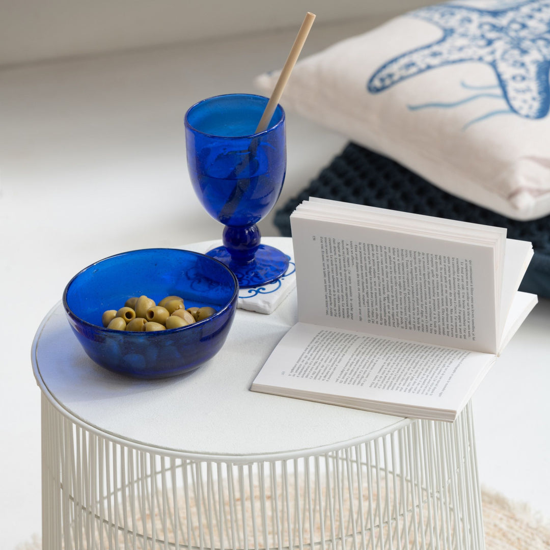 Lifestyle setting showing the Ocean Cup displayed on a modern white table.