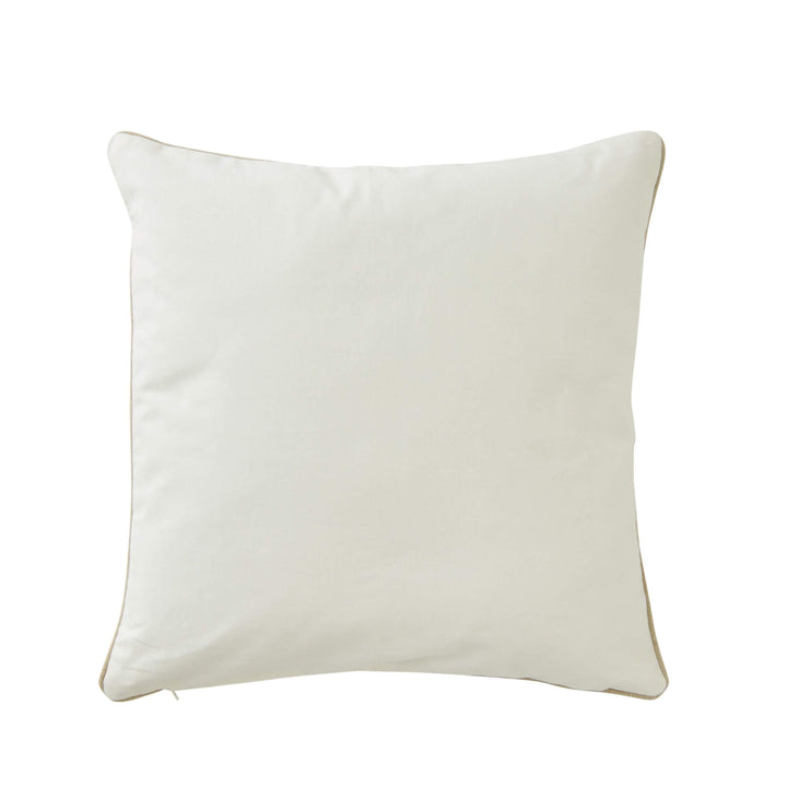 Styled coastal living room setting featuring the Ocean Shell cushion on a sofa by the sea.