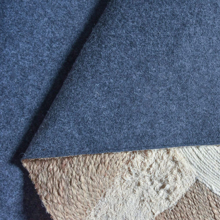 Back view of the Odisha Rug showing the fabric backing and layered construction.