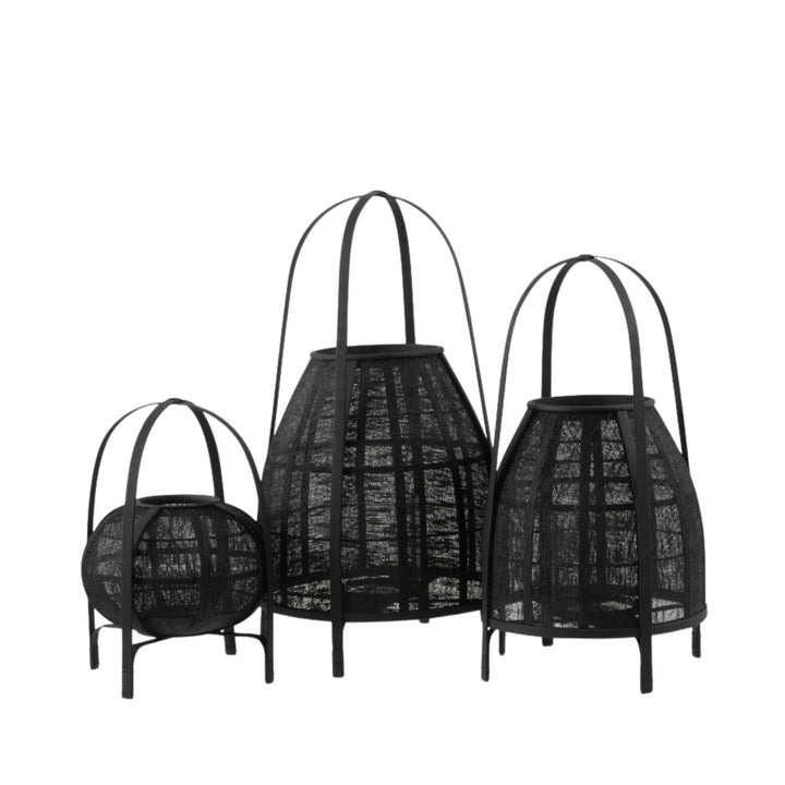 Set of Ogun bamboo lanterns in various sizes showcasing their sculptural shape and black woven design.