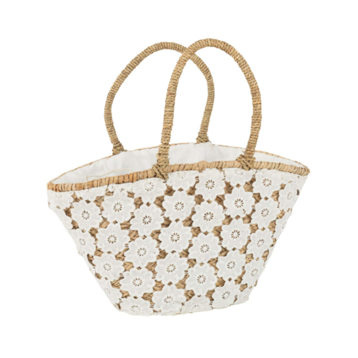 Ogun Jute Basket with floral cut-out pattern made from natural fibers.