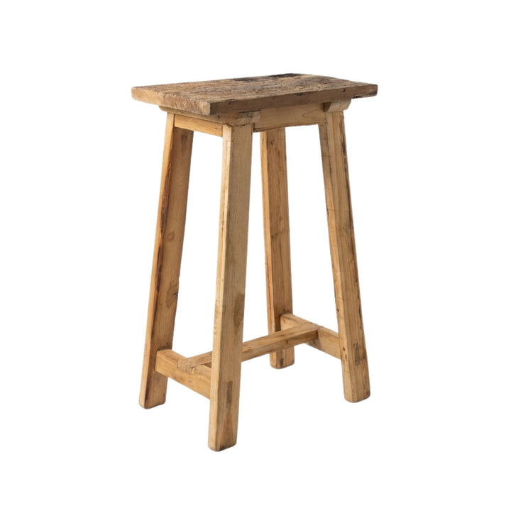 Angled view of Old Bar Stool made from sheesham wood with a rustic, handcrafted finish.