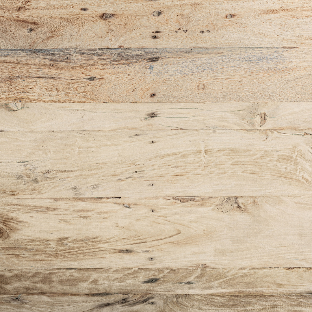 Detailed view of the rustic wooden tabletop with natural reclaimed textures.