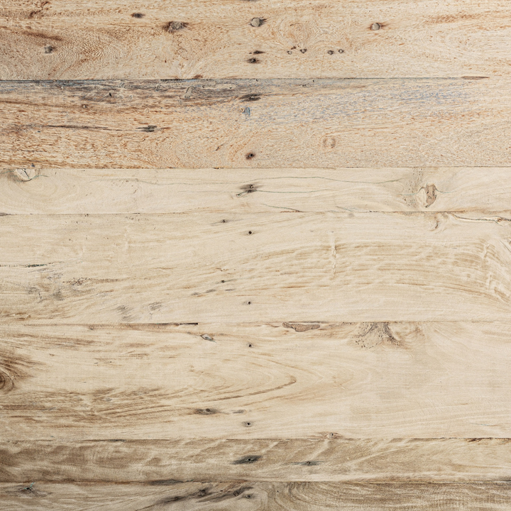 Detailed view of the rustic wooden tabletop with natural reclaimed textures.