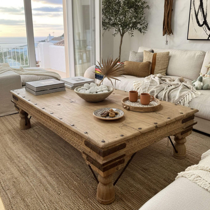 Living room scene featuring the vintage Old India reclaimed wood coffee table.