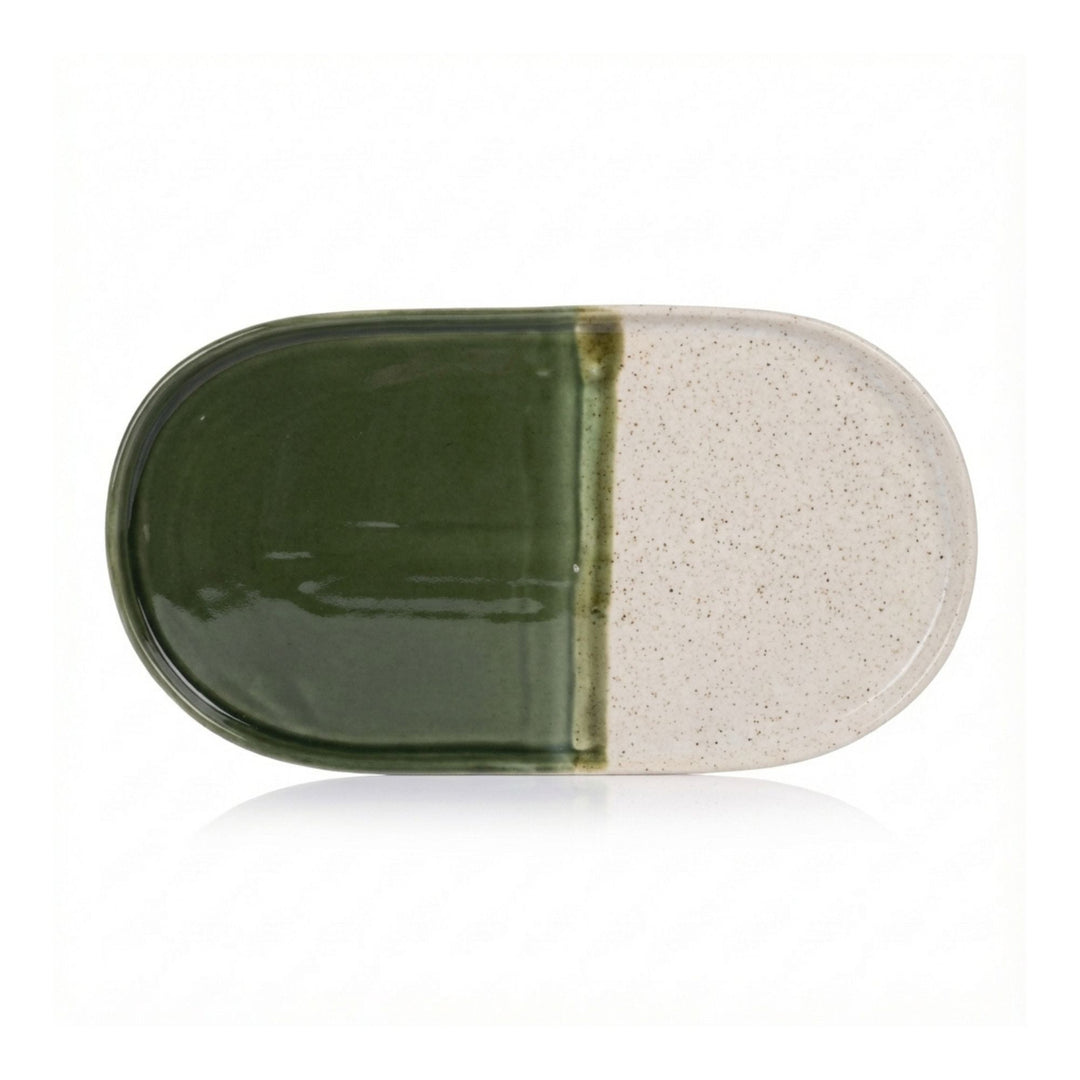 Top view of olive green ceramic serving plate with half-glazed design.