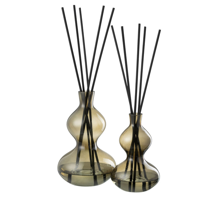 Olive & Frank Fragrance Diffuser set in tinted olive glass with black reeds.