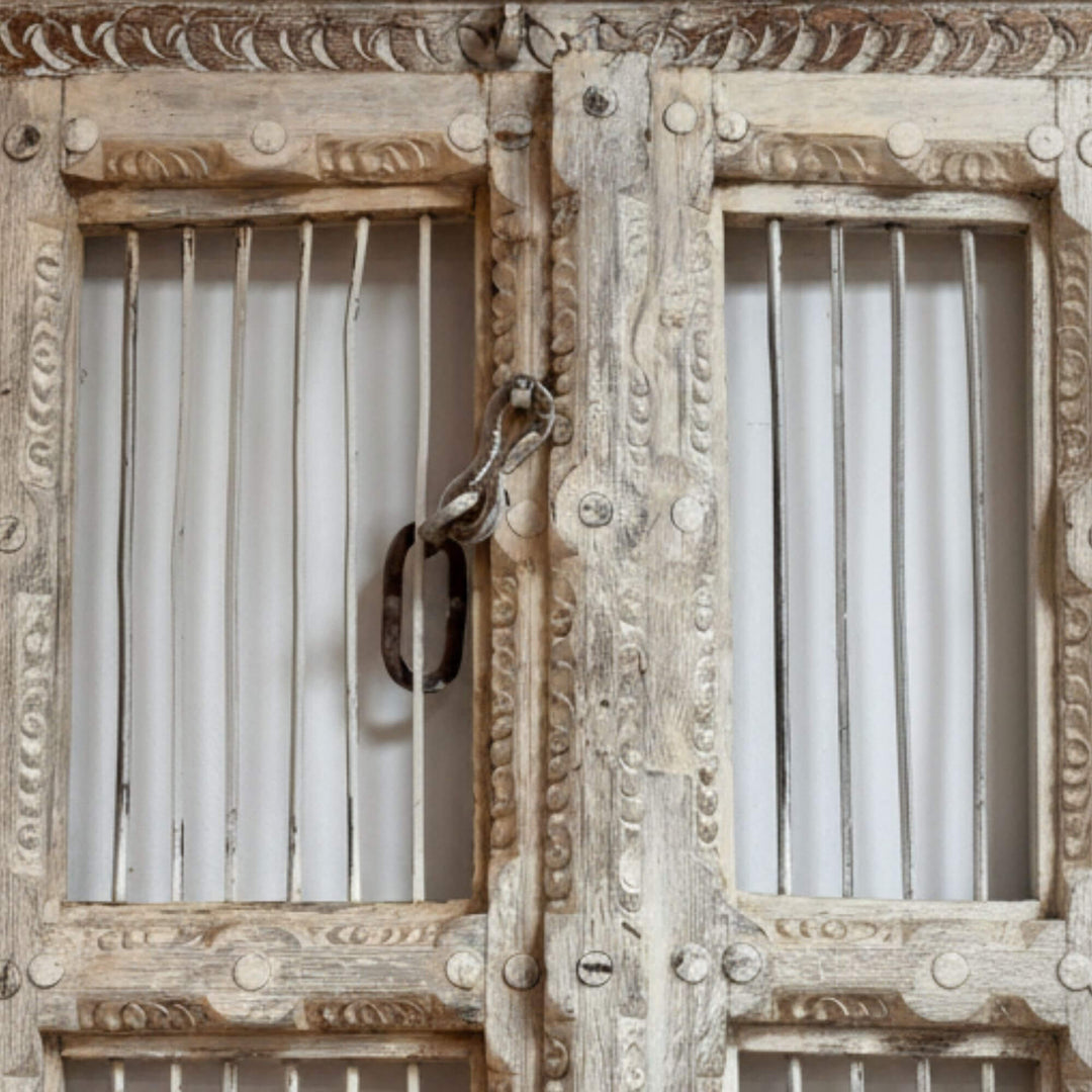 Detail of latch and panel texture on the Olmen Window in sheesham wood.

