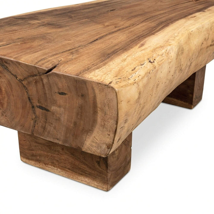 Side view highlighting the thick tabletop and sculptural wooden legs.
