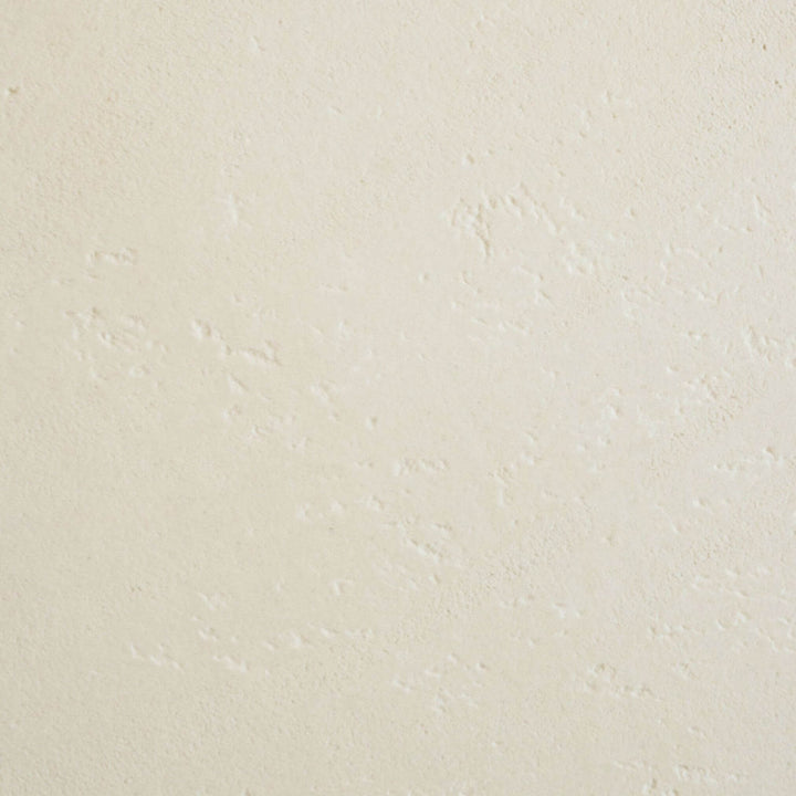 Close-up texture of off-white microcement tabletop