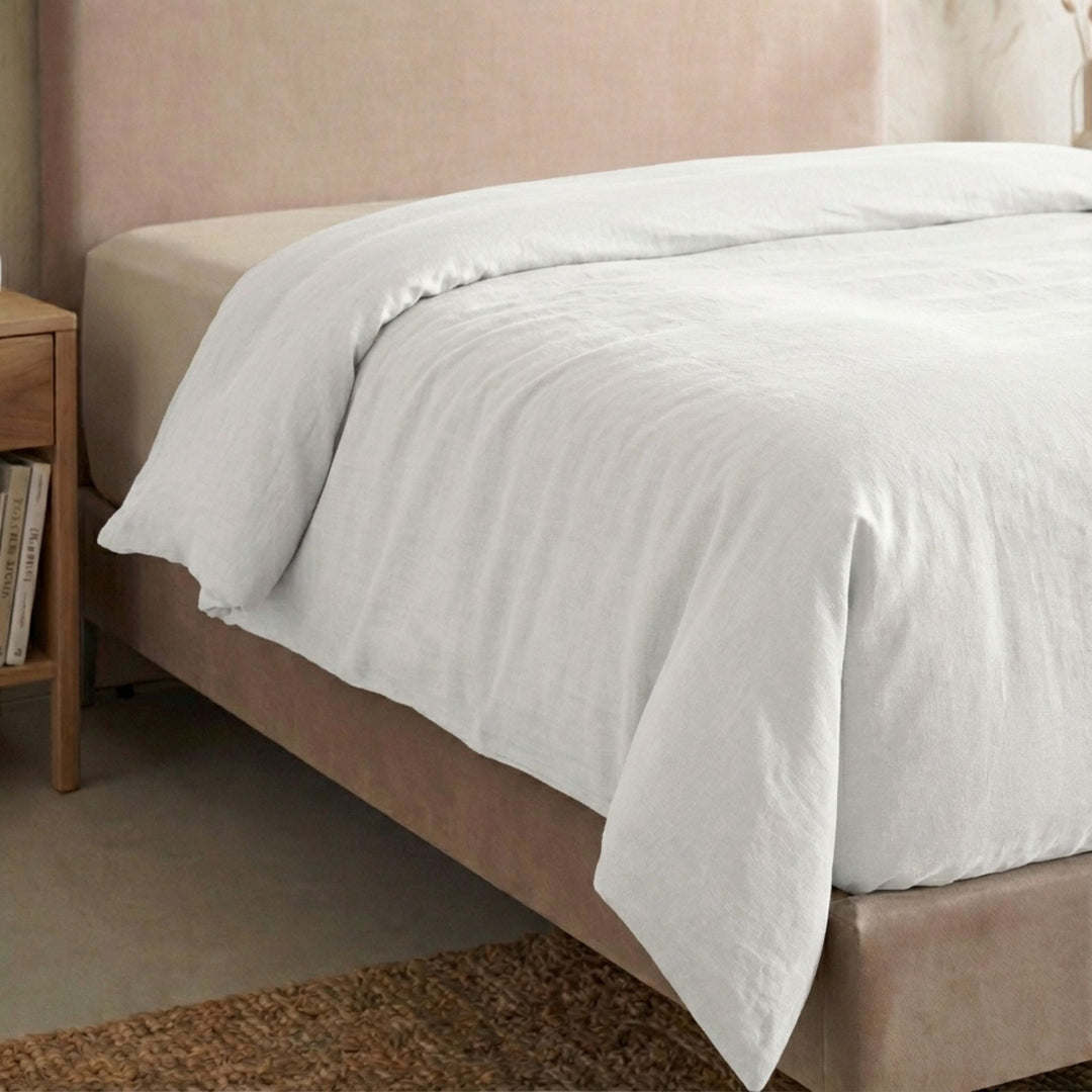 Full view of the Opera duvet cover styled on a bed, showcasing its relaxed cotton-linen texture.