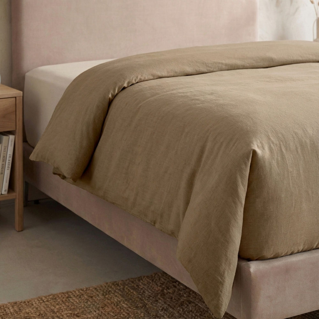 Full view of the Opera duvet cover styled on a bed, showcasing its relaxed cotton-linen texture.