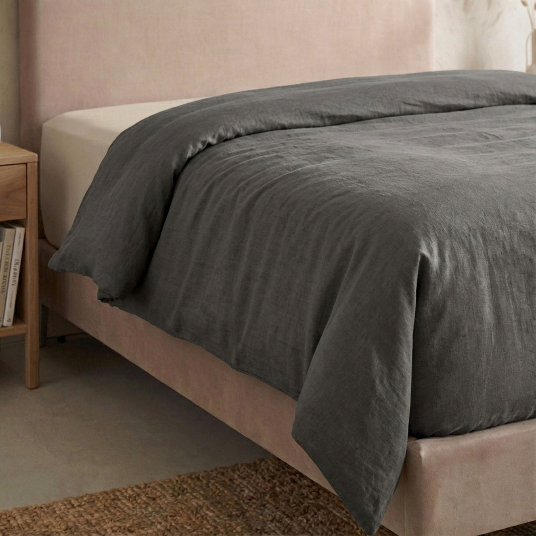 Full view of the Opera duvet cover styled on a bed, showcasing its relaxed cotton-linen texture.