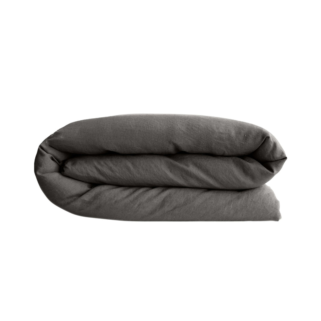 Folded Opera duvet cover displaying its soft structure and linen-rich fabric.