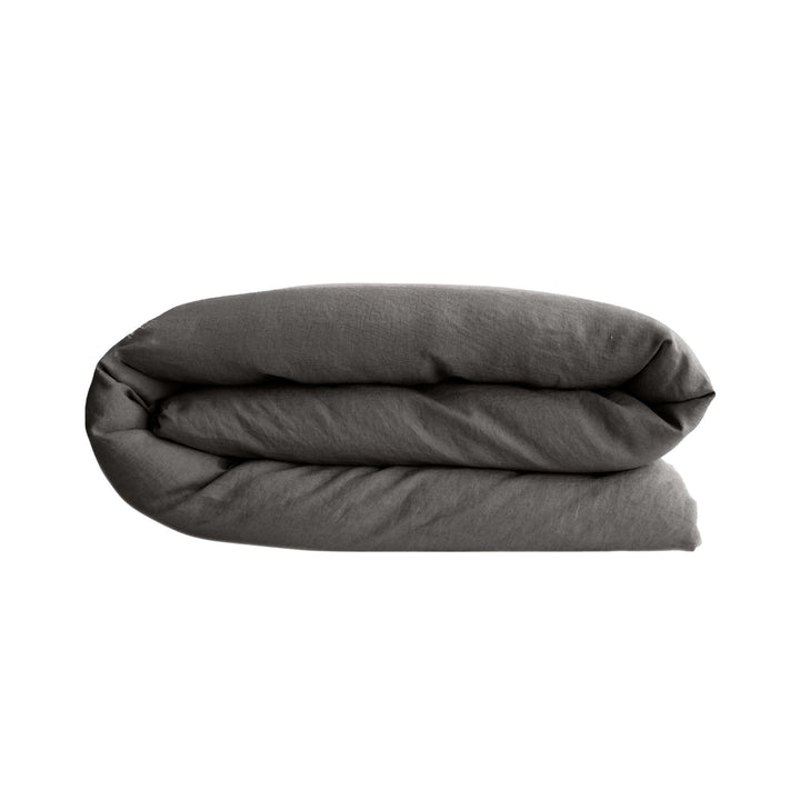 Folded Opera duvet cover displaying its soft structure and linen-rich fabric.