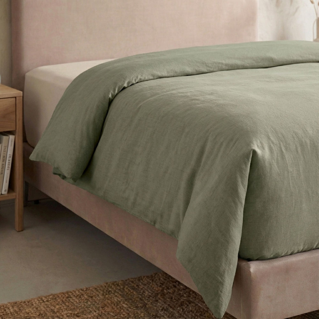 Full view of the Opera duvet cover styled on a bed, showcasing its relaxed cotton-linen texture.