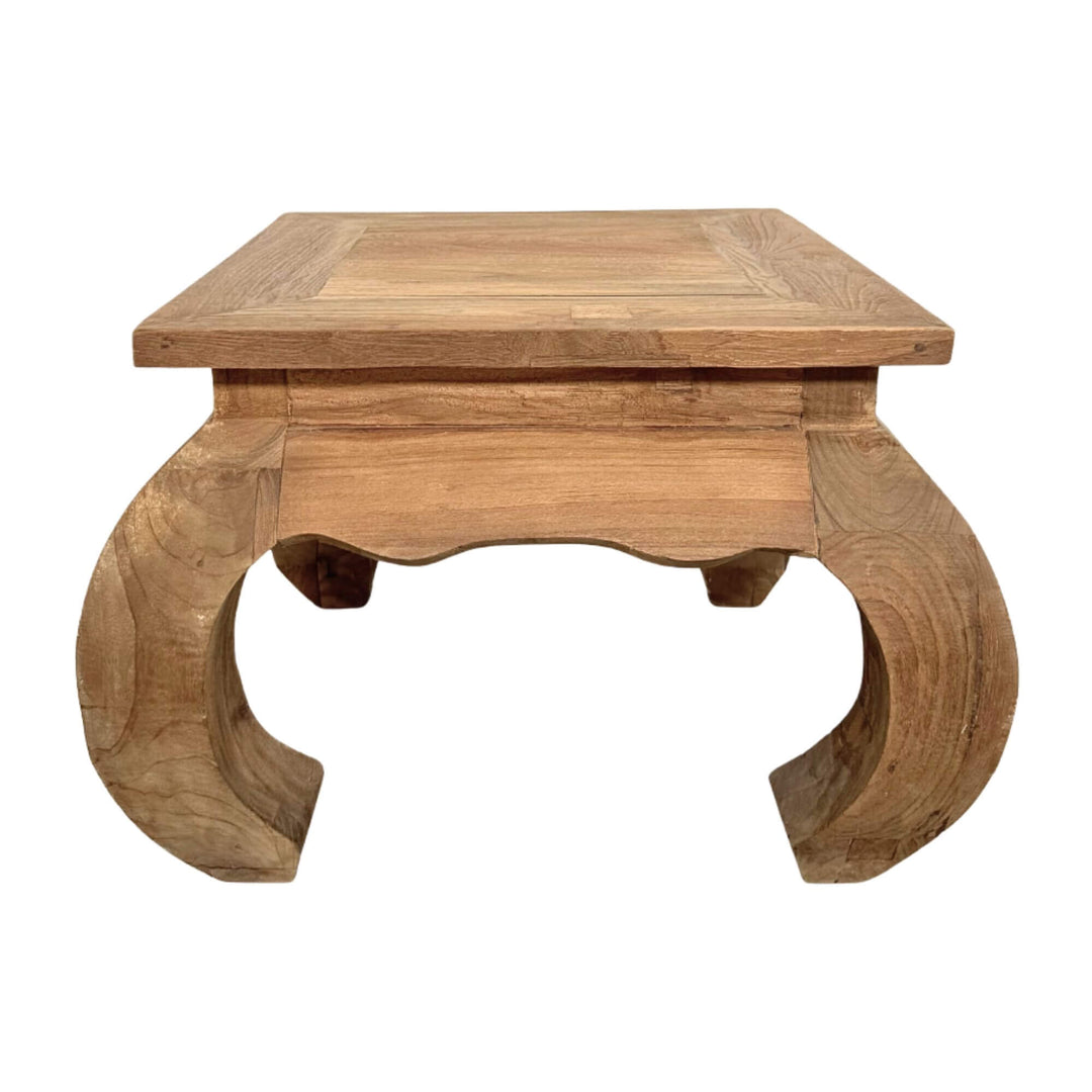 Opium Coffee Table made of natural teak wood with traditional curved legs.