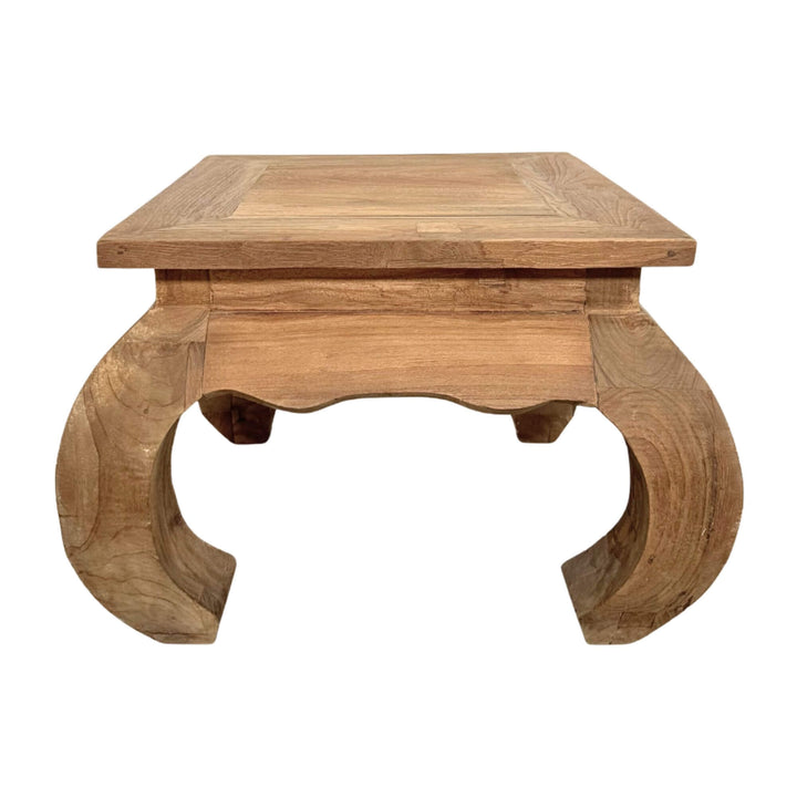 Opium Coffee Table made of natural teak wood with traditional curved legs.