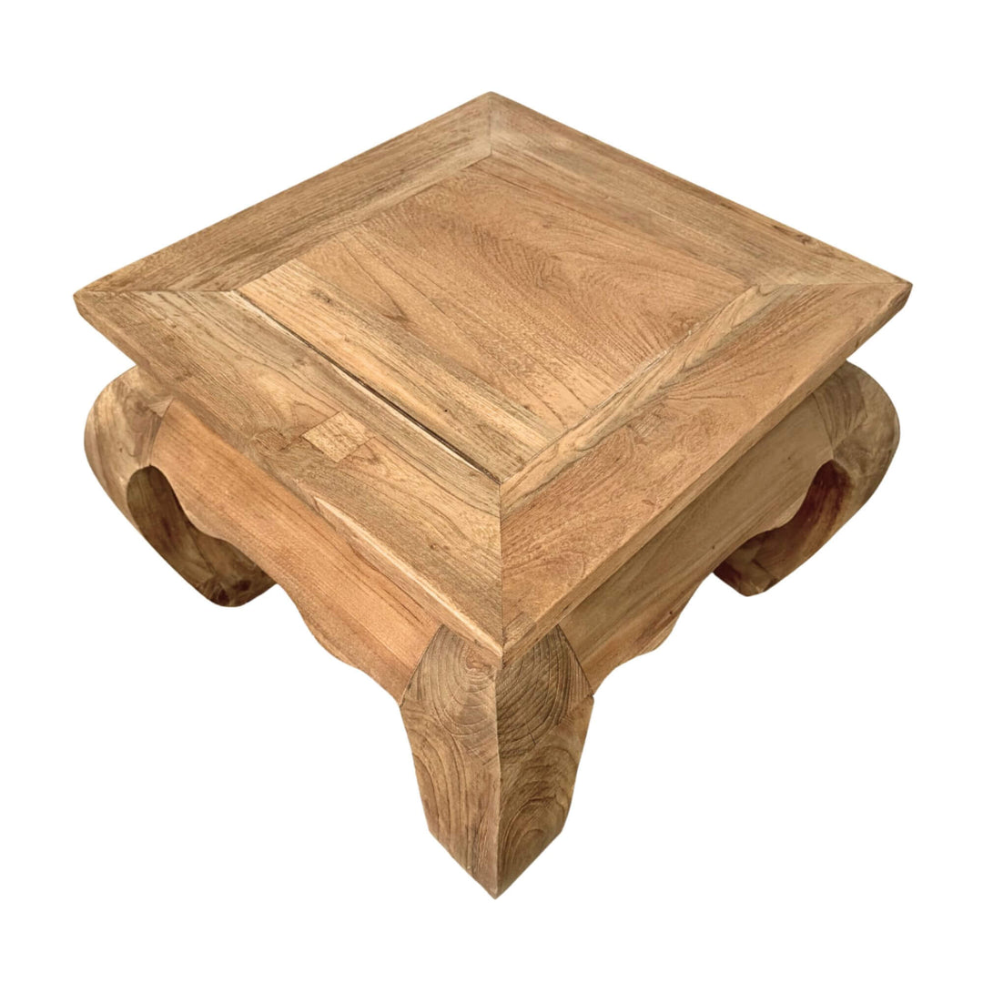 Opium Coffee Table made of natural teak wood with traditional curved legs.