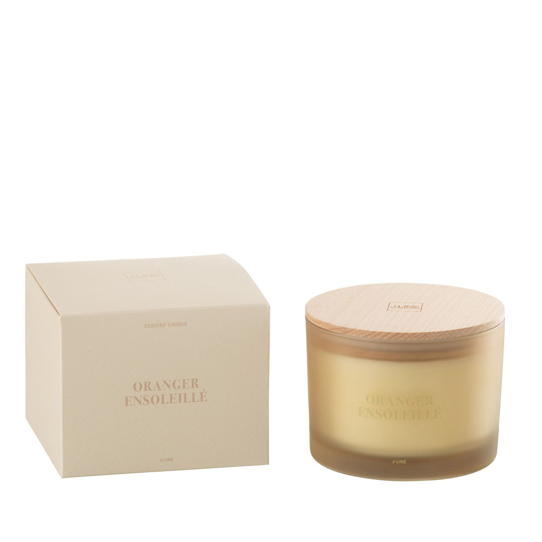 Small-size Oranger Ensoleillé candle with wooden lid beside packaging box.