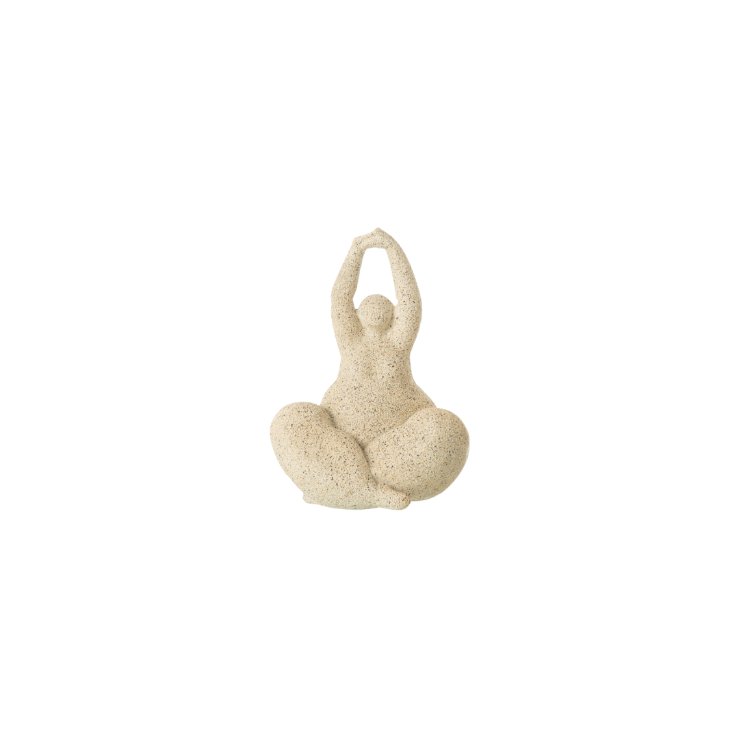 Beige resin figurative sculpture with rounded organic form on white background.