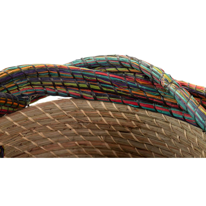 Close-up of Orisha Basket showing the multicolor woven detail and texture.

