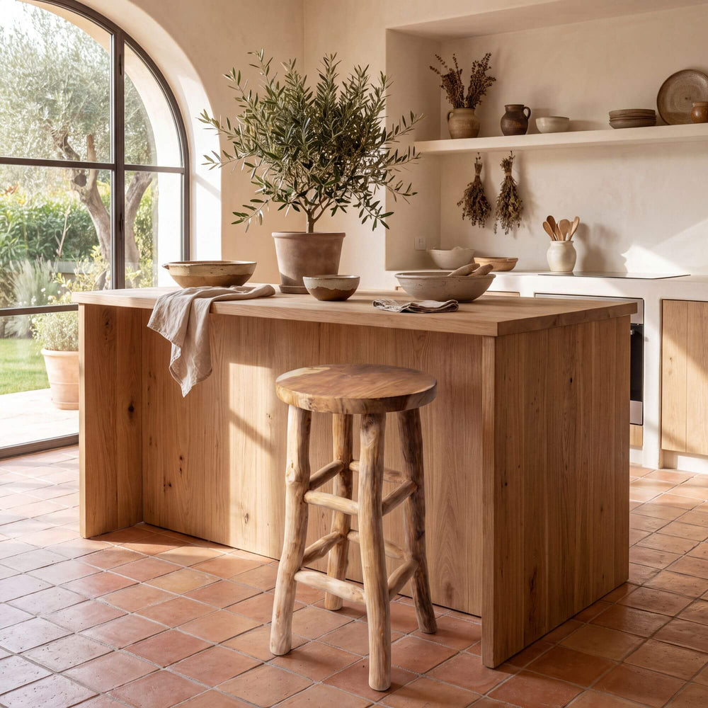 Osaka teak branch bar stool styled beside a wooden kitchen island in a warm natural interior