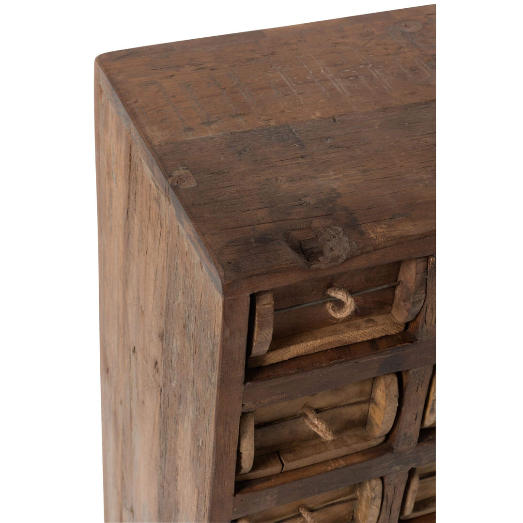 Top corner close-up of natural wood grain on Otto Drawer