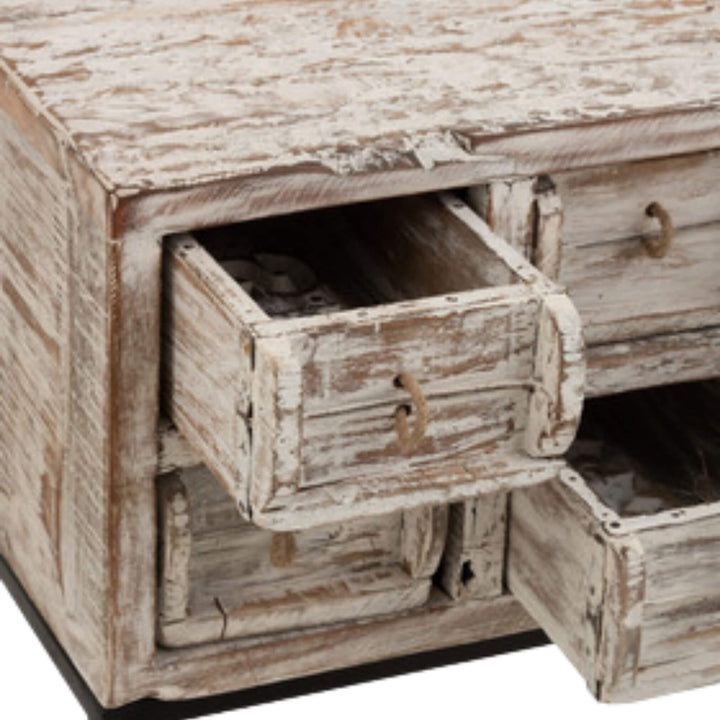 Close-up of distressed wood drawer detailing on Otto cabinet.