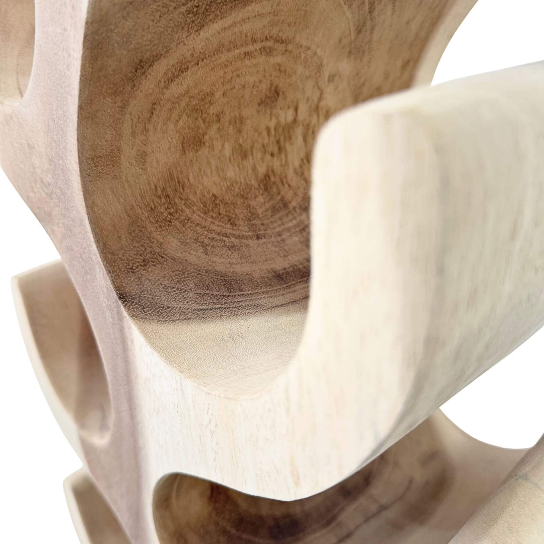 Detail of Osiris Wine Rack top curve and smooth hand-finished surface.