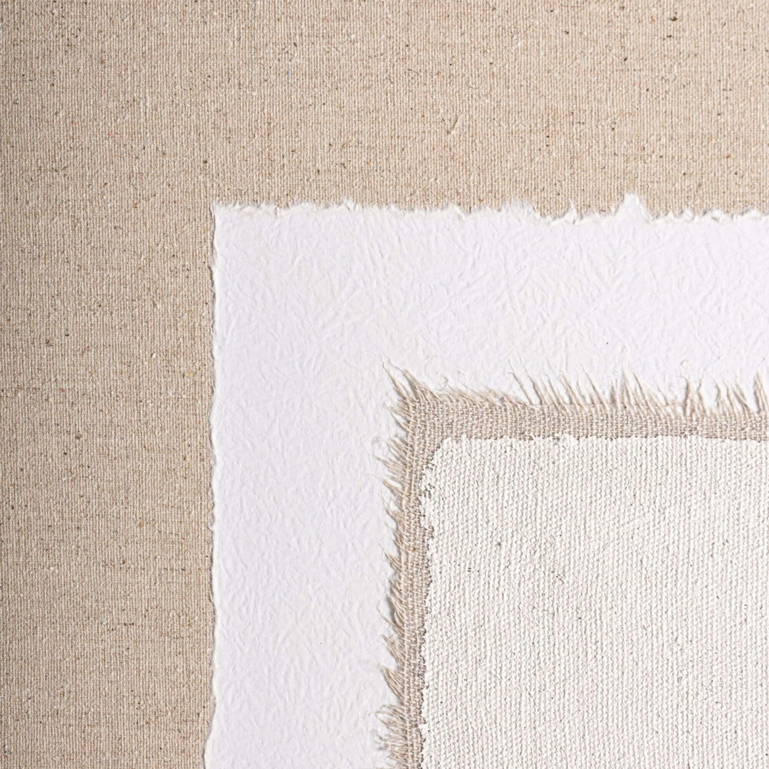 Detail view highlighting the soft beige and off-white abstract composition of the Pagai artwork.