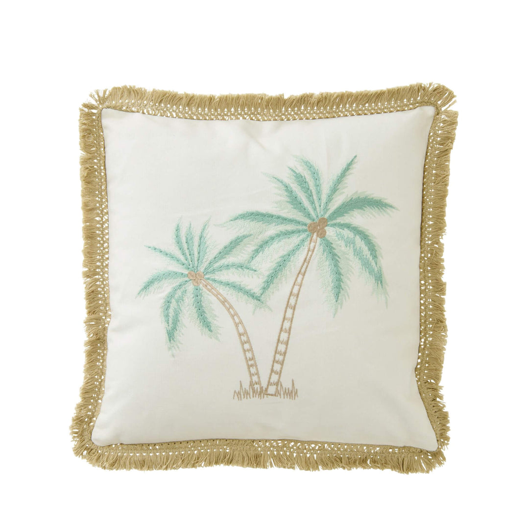 Front view of the Palm Breeze cushion showing its embroidered palm tree motif and fringed border.
