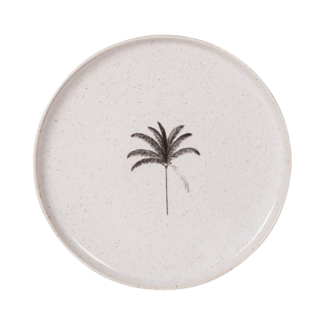 Top view of an ivory Palm ceramic plate with a black botanical motif