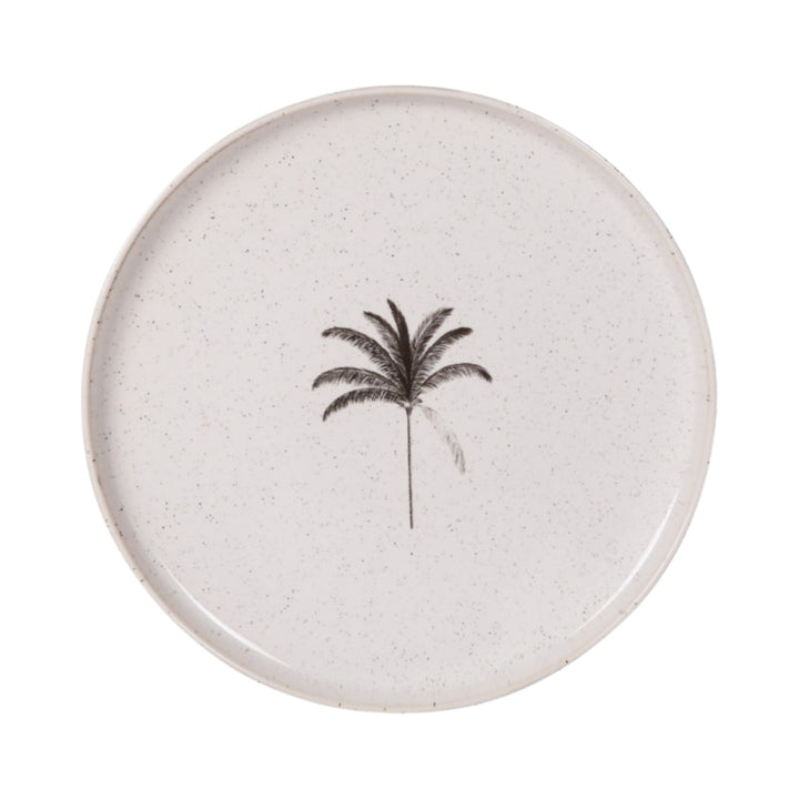 Top view of an ivory Palm ceramic plate with a black botanical motif
