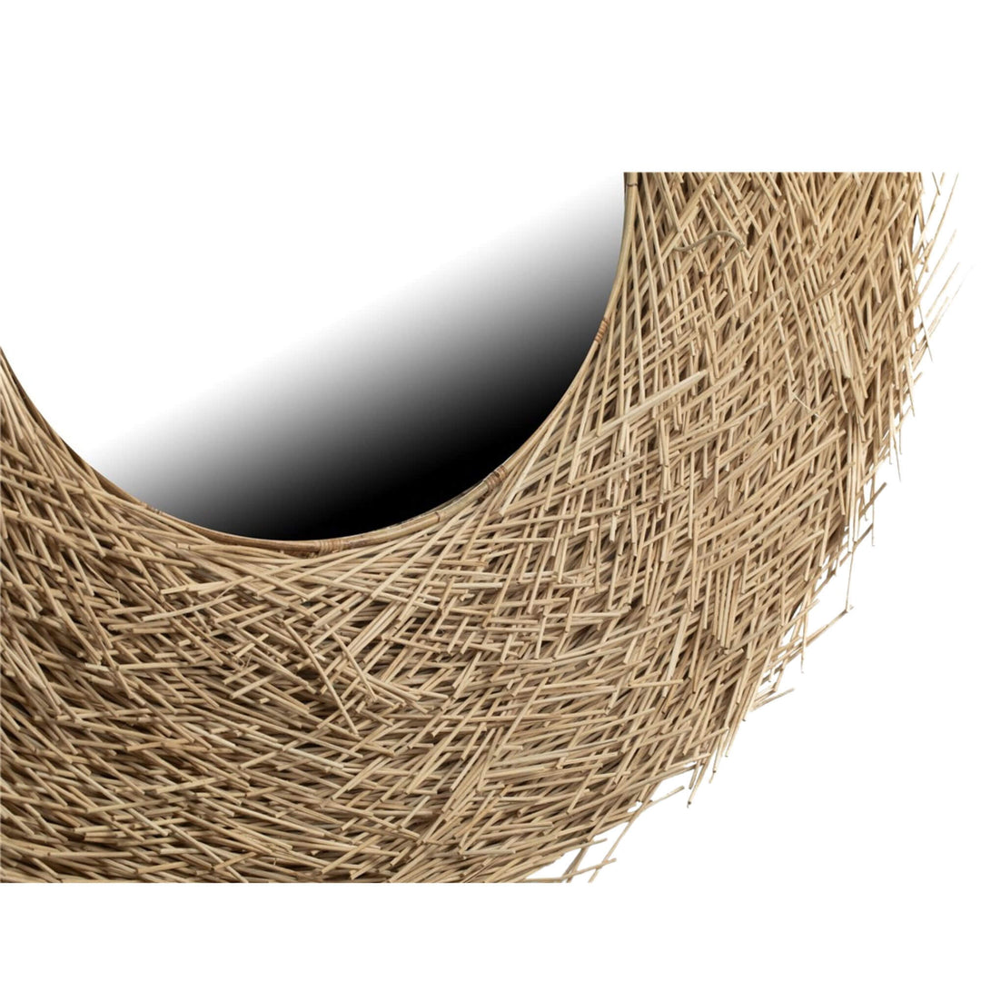 Close-up of natural rattan weave on Pandang wall mirror.