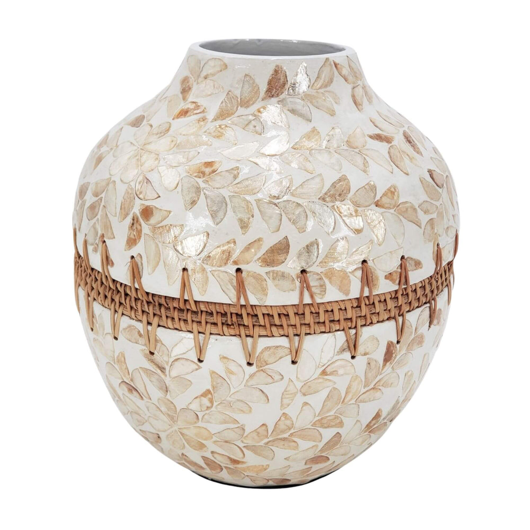 Pantai Vase made from natural capiz shell and rattan with pearl-toned leaf pattern.