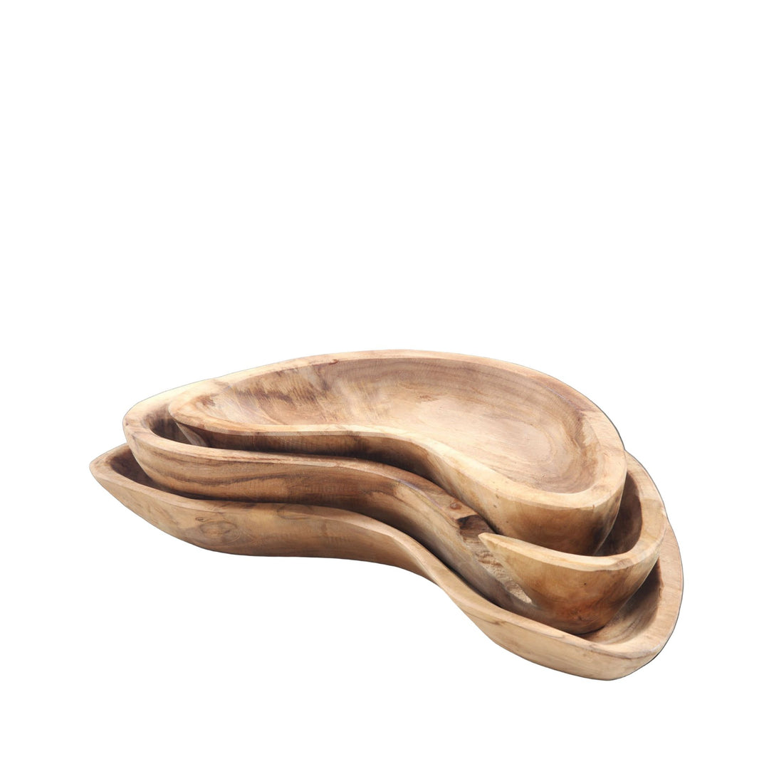 Front view of the Pawan teak wood plate with organic flowing shape.