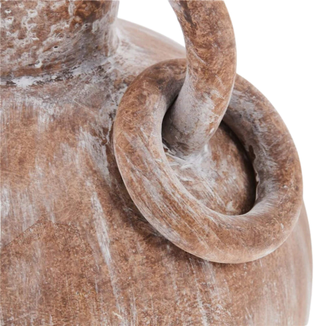 Close-up of Paxos Vase showing handcrafted terracotta surface and decorative handles.