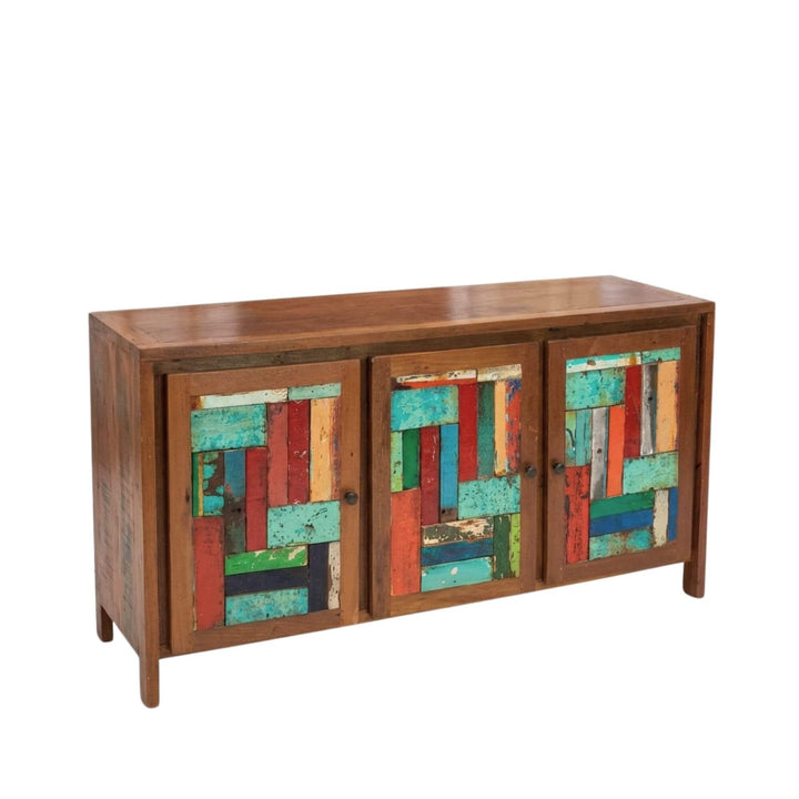 Angled view of Persephone Teak Buffet highlighting its colorful reclaimed wood doors.