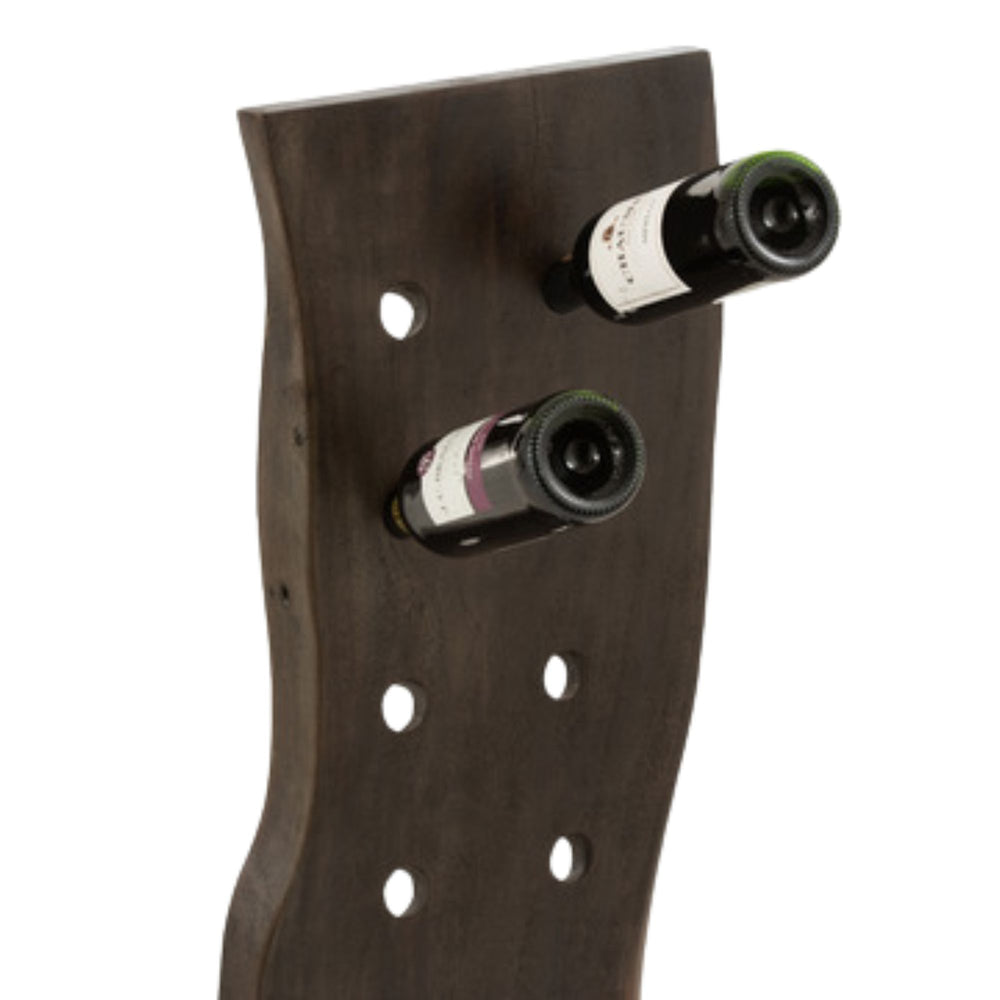Angled view showing the organic shape and drilled bottle slots in the wooden rack.