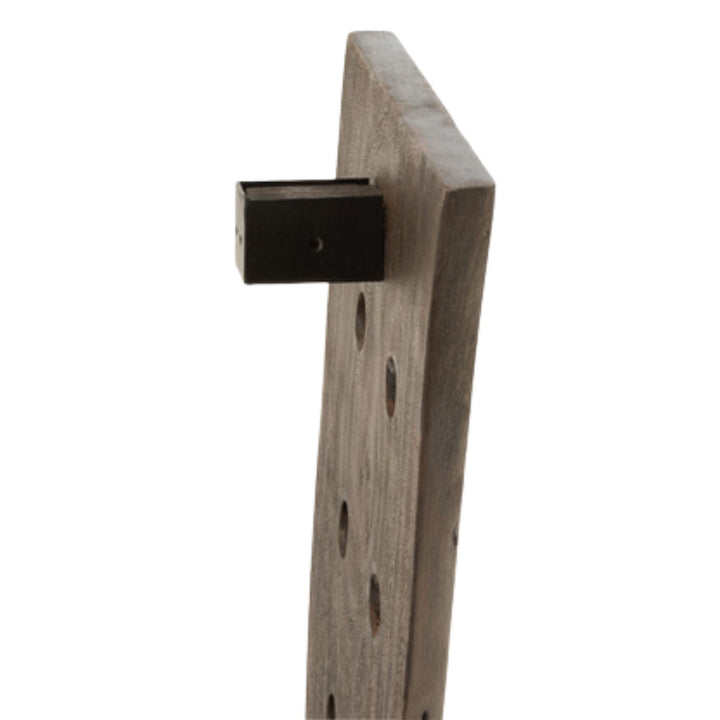Side view highlighting the thickness and wall-mount structure of the bottle rack.